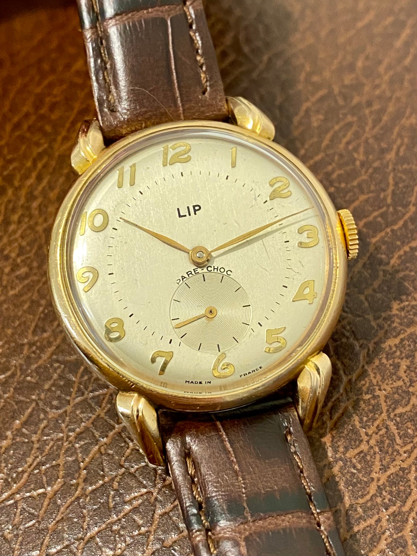 LIP R25 Plaqué Or « Cornes de Vache » Montre Vintage mécanique 1950