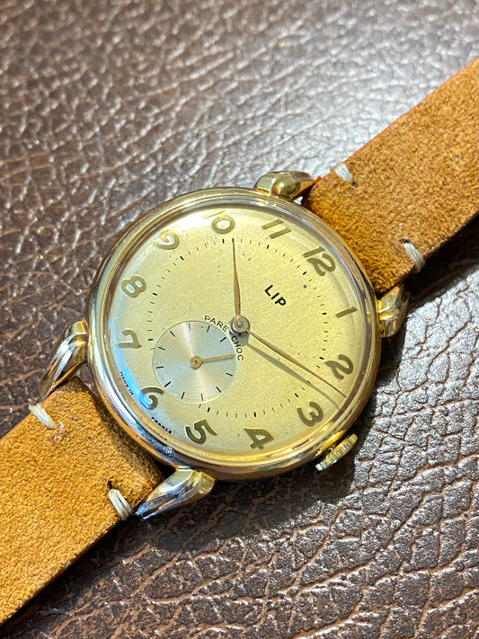 LIP PareChoc R25 Plaqué Or 40 Microns "Cornes de Vache" Montre Vintage Mécanique 1950