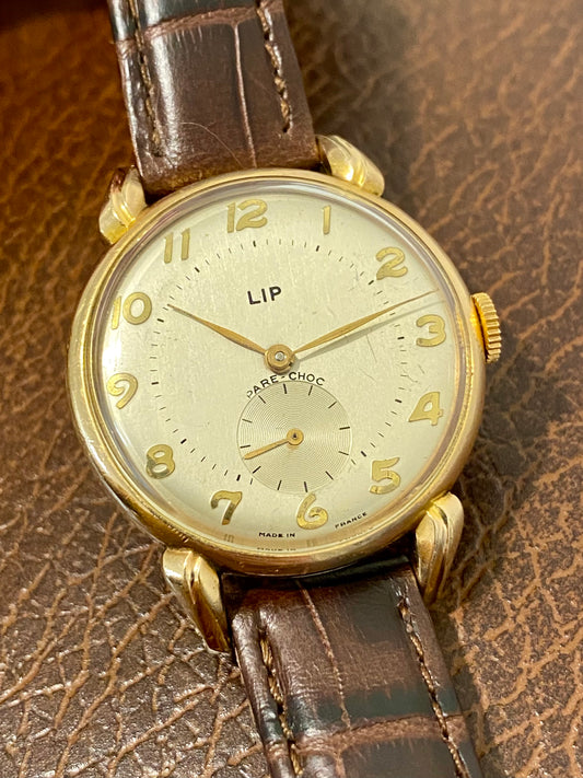 LIP R25 Plaqué Or « Cornes de Vache » Montre Vintage mécanique 1950