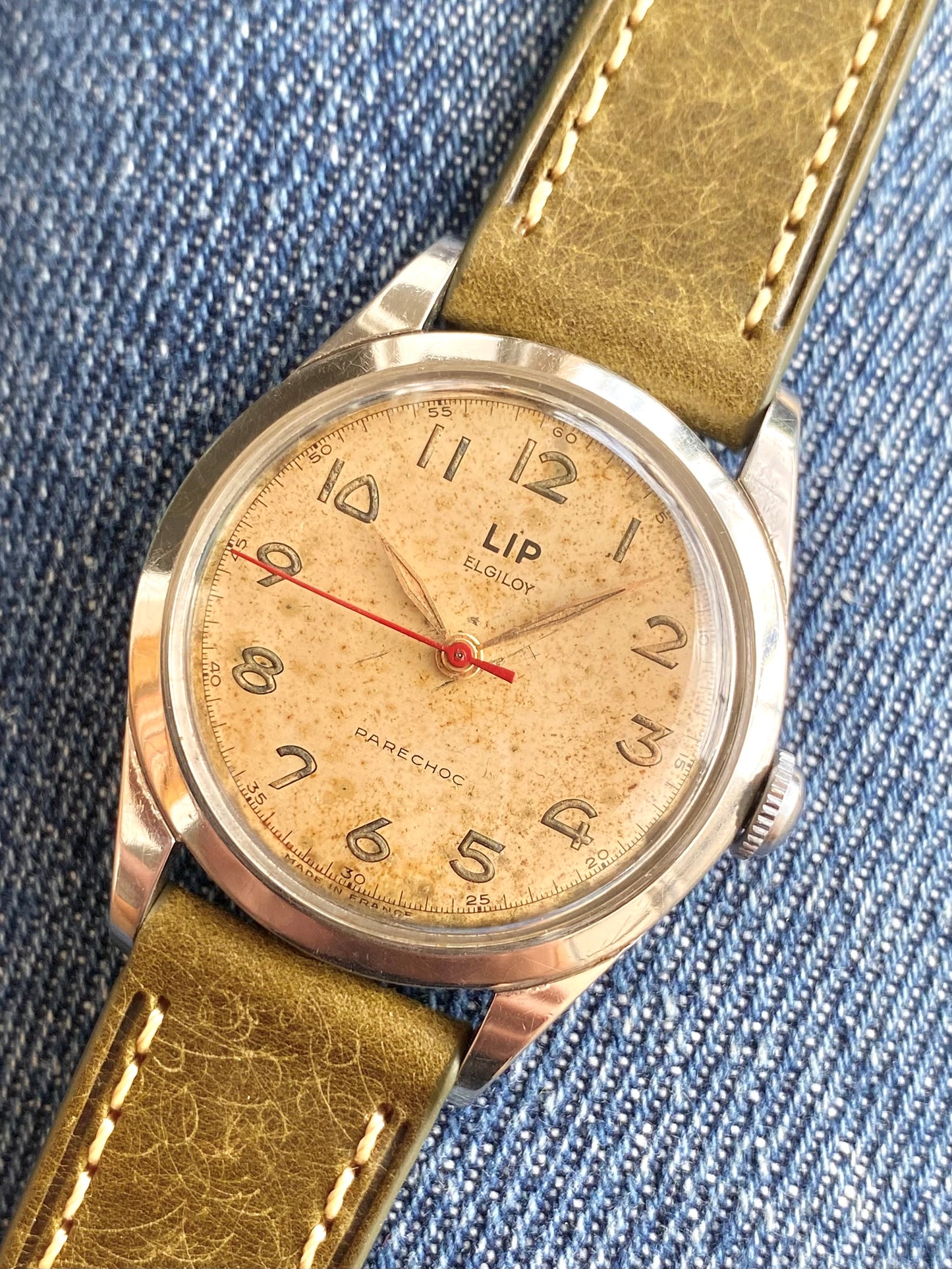 LIP Elgiloy R25 PareChoc Made In France Patinée - Montre Vintage Mécanique 1950